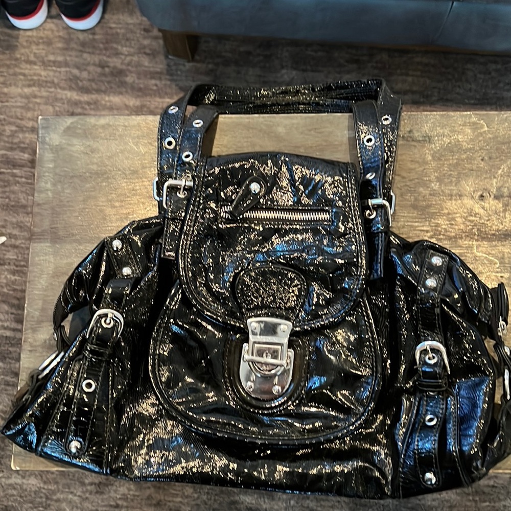 Black Patent leather look purse. Well loved.